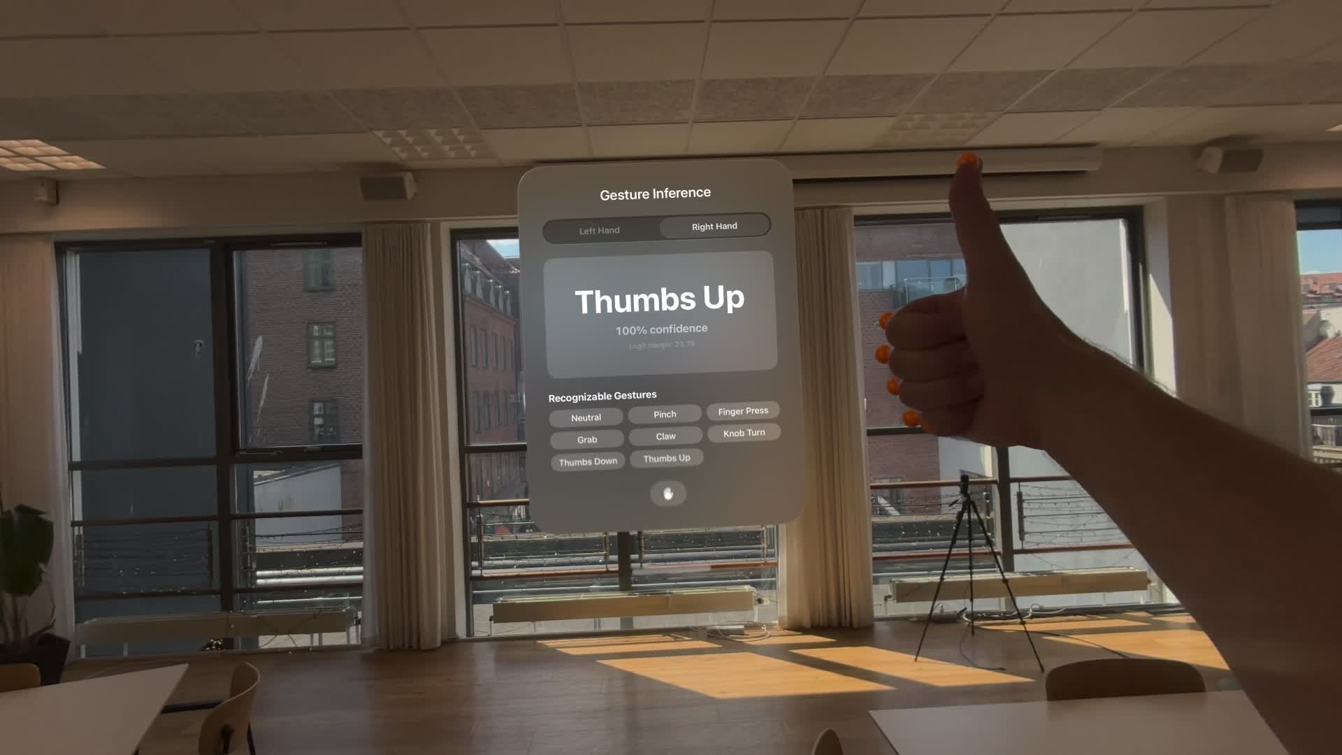 A thumbs-up gesture recognised in the Apple Vision Pro demo.
