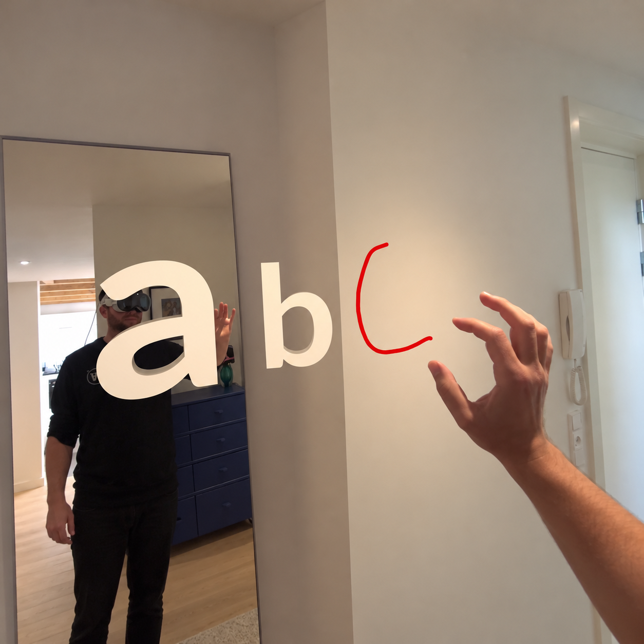 The 3D handwriting demo with recognised a and b, a red handwritten c and the drawing hand.